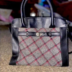 Used like new. Plaid handheld/shoulder purse